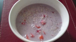 Quinoa, coconut milk, strawberries, raspberries and agave nectar