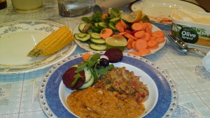 Corn-on-the-Cob, salad, red lentils and Bhaingan-ka-Bharta