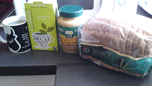 Decaf green tea, stoneground wholemeal bread with peanut butter